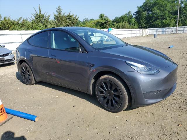 Photo 4 from auction – 2023 TESLA MODEL Y with VIN 7SAYGDEE6PA050410