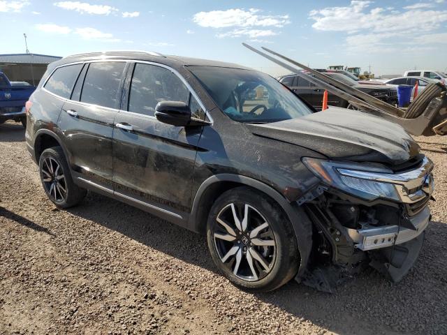 Photo 4 from auction – 2022 HONDA PILOT ELITE with VIN 5FNYF6H05NB055139