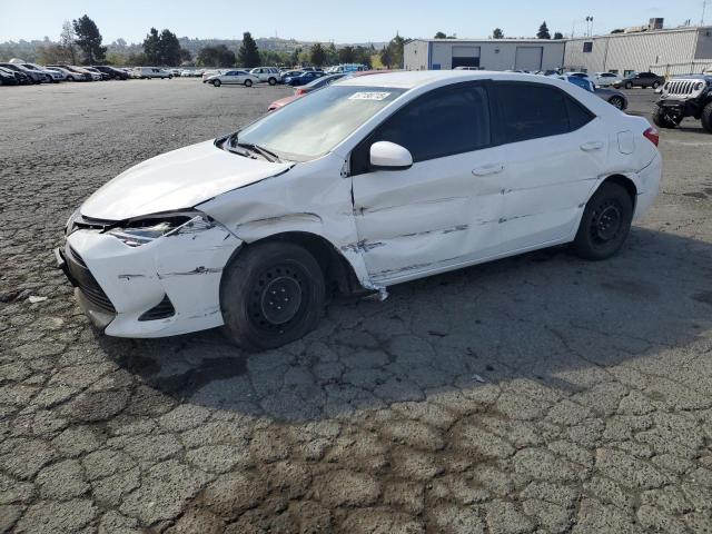 TOYOTA COROLLA L 2019 with VIN 5YFBURHE4KP874135 - Photo from auction
