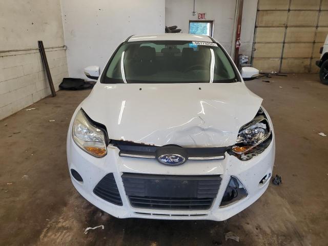 Photo 5 from auction – 2014 FORD FOCUS with VIN 1FADP3F26EL373935