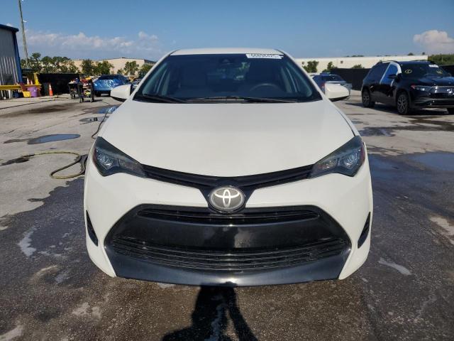 Photo 5 from auction – 2018 TOYOTA COROLLA L with VIN 5YFBURHE0JP744853
