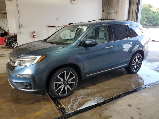 HONDA PILOT TOUR 2021 with VIN 5FNYF6H65MB029949 - Photo from auction