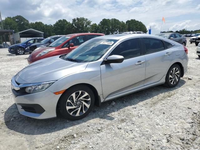 HONDA CIVIC EX 2017 z numerem VIN 19XFC2F77HE052178 - Zdjęcie z aukcji