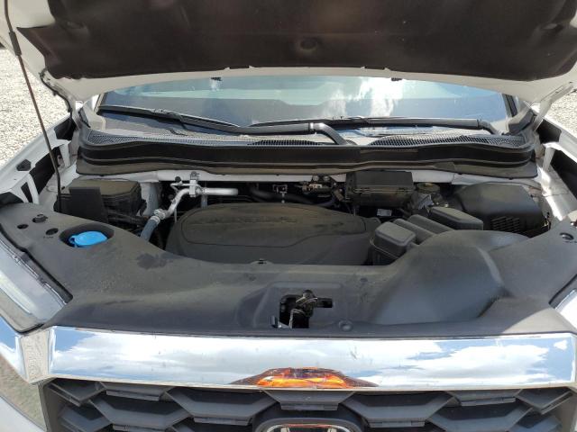 Photo 12 from auction – 2023 HONDA PASSPORT E with VIN 5FNYF8H5XPB018355