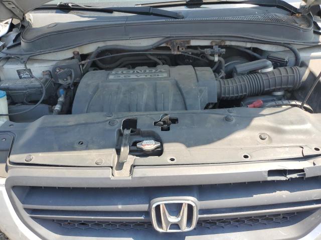 Photo 12 from auction – 2005 HONDA PILOT EX with VIN 2HKYF18435H561754