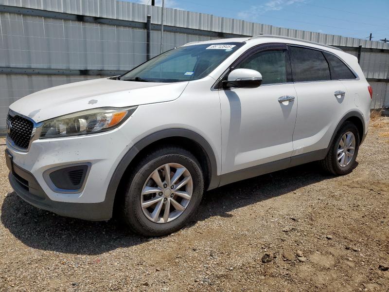 KIA SORENTO LX 2016 with VIN 5XYPG4A33GG021391 - Photo from auction