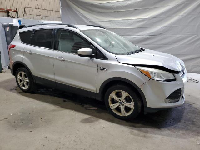 Photo 4 from auction – 2014 FORD ESCAPE SE with VIN 1FMCU9G96EUC77306