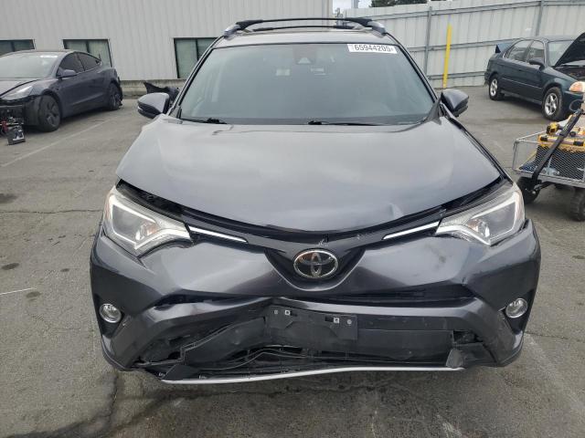 Photo 5 from auction – 2017 TOYOTA RAV4 XLE with VIN JTMWFREV6HD097128