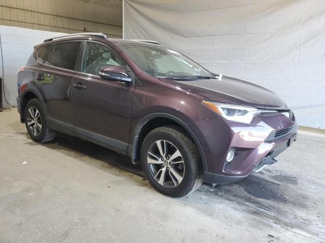 Photo 4 from auction – 2017 TOYOTA RAV4 XLE with VIN 2T3RFREVXHW614091