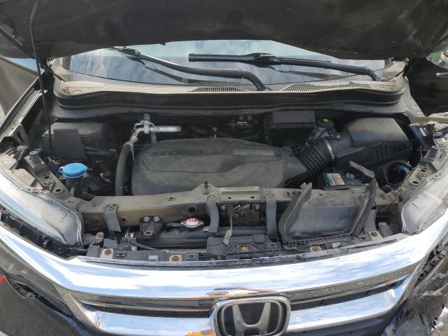 Photo 12 from auction – 2020 HONDA PILOT LX with VIN 5FNYF6H17LB024111