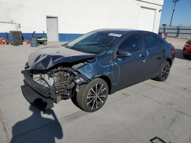 TOYOTA COROLLA L 2017 with VIN 5YFBURHE8HP667935 - Photo from auction