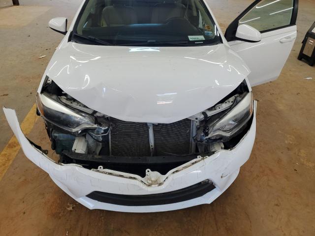 Photo 11 from auction – 2014 TOYOTA COROLLA L with VIN 2T1BURHE5EC145257