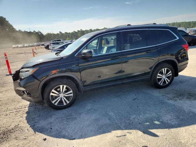 HONDA PILOT EXL 2017 with VIN 5FNYF6H50HB084418 - Photo from auction