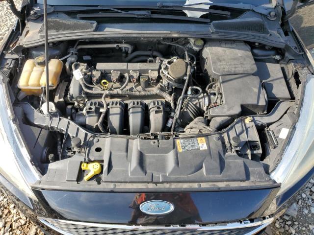 Photo 11 from auction – 2015 FORD FOCUS SE with VIN 1FADP3F24FL227843
