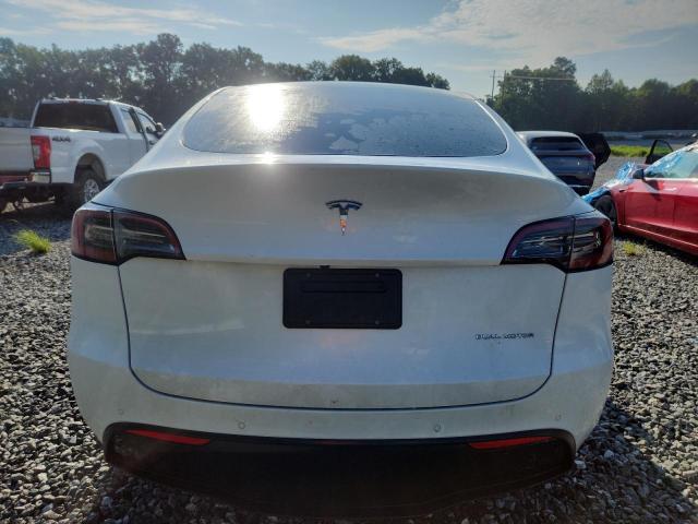Photo 6 from auction – 2022 TESLA MODEL Y with VIN 7SAYGDEE5NF395315