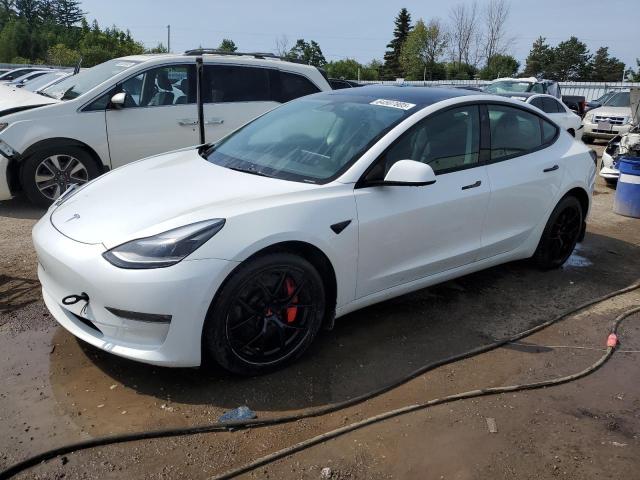 TESLA MODEL 3 2022 with VIN 5YJ3E1EC4NF343068 - Photo from auction