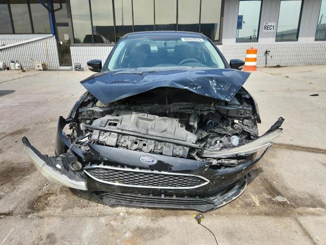 Photo 5 from auction – 2016 FORD FOCUS SE with VIN 1FADP3F26GL326861