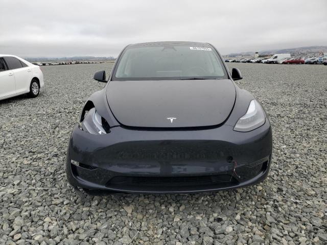 Photo 5 from auction – 2025 TESLA MODEL Y with VIN 7SAYGDED9SF316327
