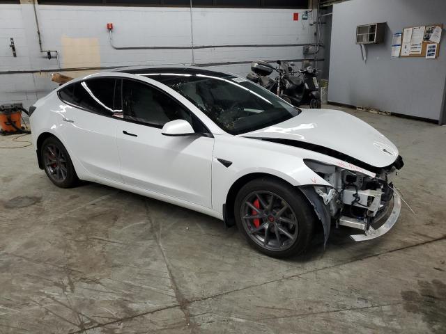 Photo 4 from auction – 2022 TESLA MODEL 3 with VIN 5YJ3E1EB6NF348201