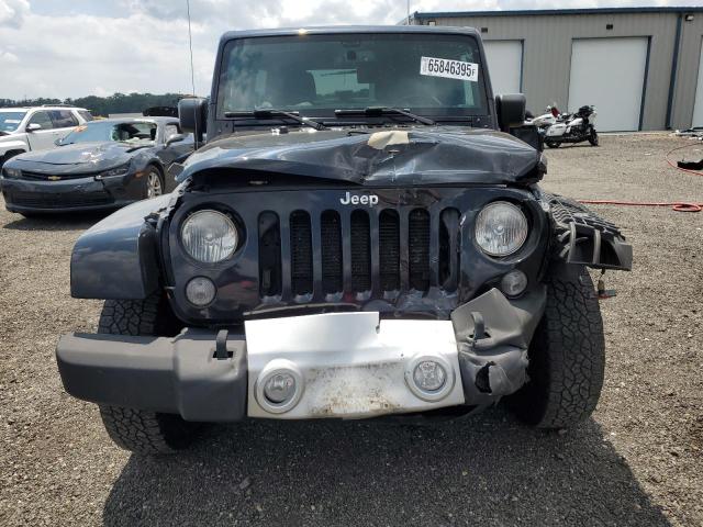 Photo 11 from auction – 2015 JEEP WRANGLER U with VIN 1C4BJWEG4FL529540