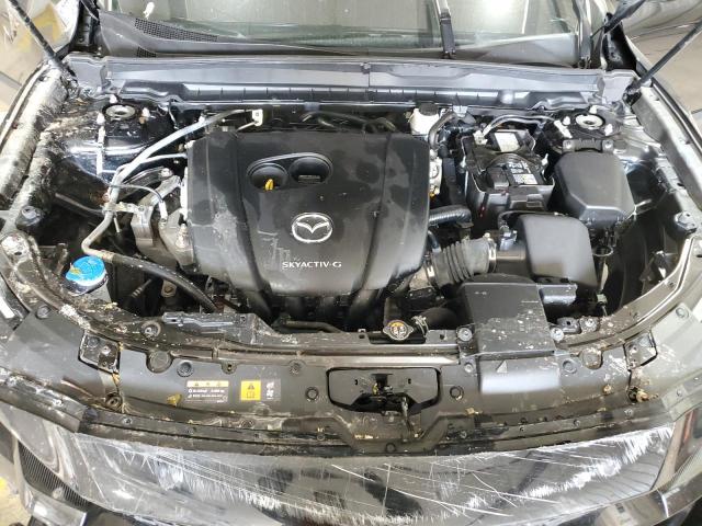 Photo 12 from auction – 2023 MAZDA CX-50 PREF with VIN 7MMVABCM2PN114219