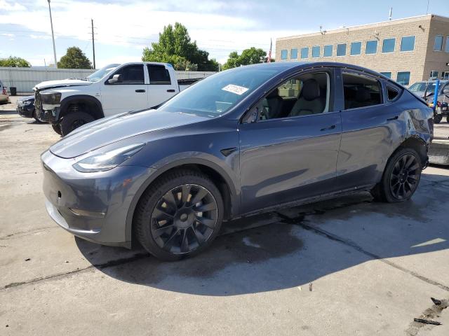 TESLA MODEL Y 2023 with VIN 7SAYGDEE4PF615465 - Photo from auction
