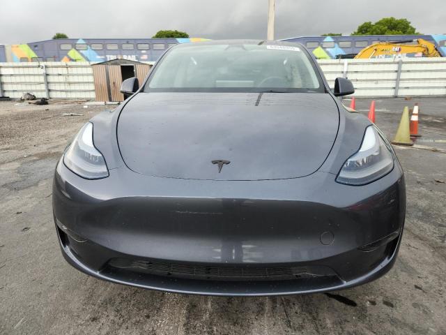 Photo 5 from auction – 2023 TESLA MODEL Y with VIN 7SAYGDED8PF933998