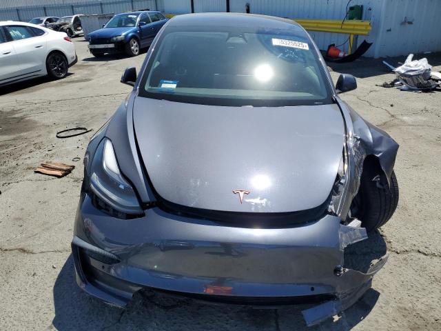 Photo 5 from auction – 2021 TESLA MODEL 3 with VIN 5YJ3E1EB9MF002318
