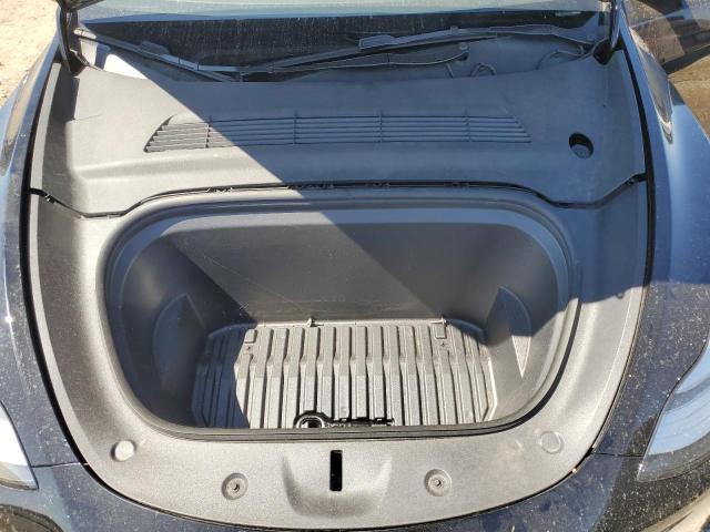 Photo 11 from auction – 2023 TESLA MODEL Y with VIN 7SAYGDEE1PA110268