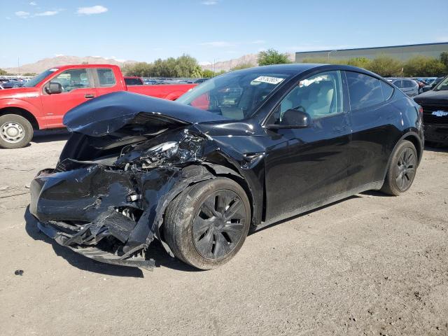 TESLA MODEL Y 2024 with VIN 7SAYGDED0RF165551 - Photo from auction
