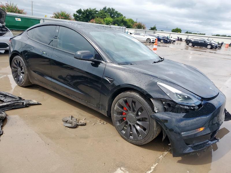 Photo 4 from auction – 2022 TESLA MODEL 3 with VIN 5YJ3E1EC1NF199348