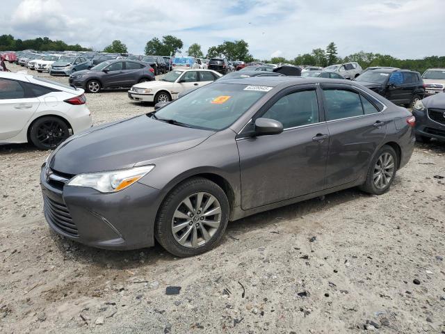 TOYOTA CAMRY LE 2017 with VIN 4T1BF1FK9HU652377 - Photo from auction