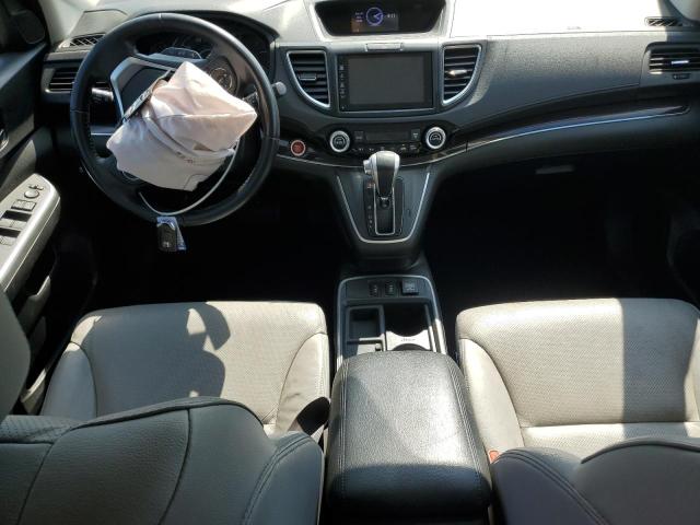 Photo 8 from auction – 2015 HONDA CR-V EXL with VIN 2HKRM4H78FH677670