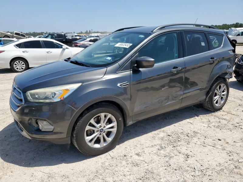 FORD ESCAPE SE 2017 with VIN 1FMCU9GD5HUB08709 - Photo from auction