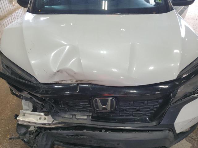 Photo 12 from auction – 2021 HONDA PASSPORT E with VIN 5FNYF7H54MB014209