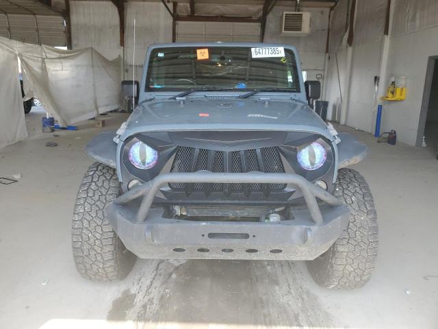 Photo 5 from auction – 2014 JEEP WRANGLER U with VIN 1C4BJWKG6EL138988