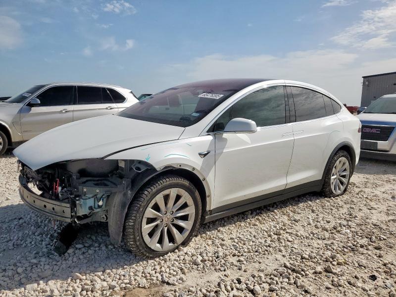 TESLA MODEL X 2017 with VIN 5YJXCAE22HF061675 - Photo from auction