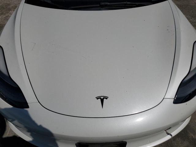 Photo 11 from auction – 2022 TESLA MODEL 3 with VIN 5YJ3E1EB4NF337469