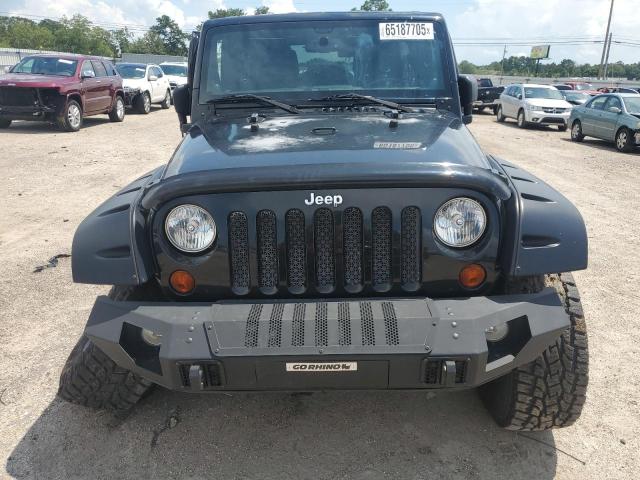 Photo 5 from auction – 2013 JEEP WRANGLER U with VIN 1C4BJWDG6DL557869