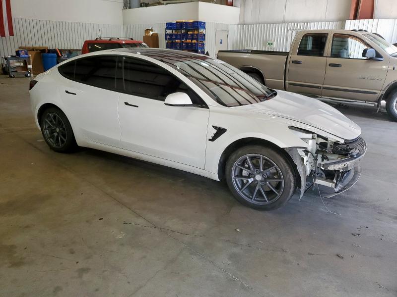 Photo 4 from auction – 2022 TESLA MODEL 3 with VIN 5YJ3E1EA6NF101753