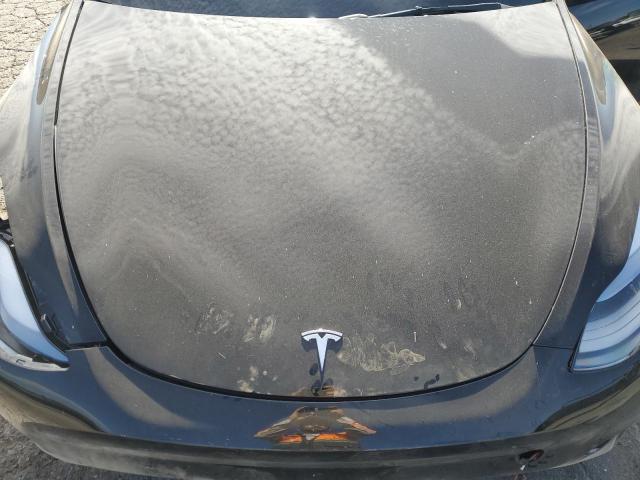 Photo 11 from auction – 2025 TESLA MODEL Y with VIN 7SAYGDED0SF320461