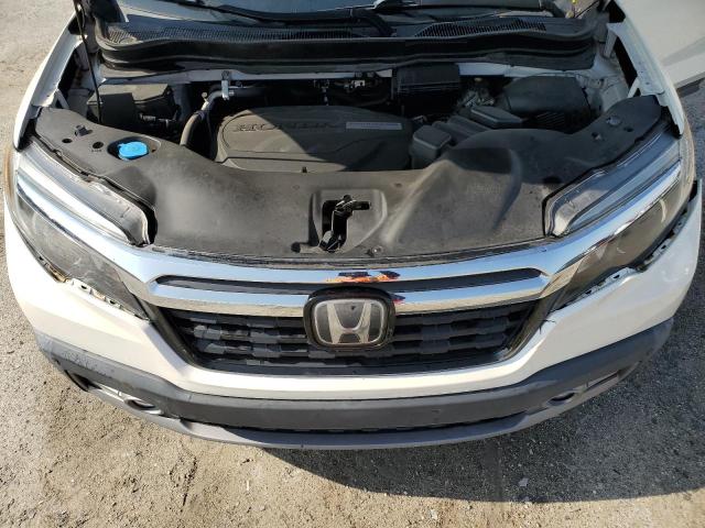 Photo 11 from auction – 2017 HONDA RIDGELINE with VIN 5FPYK3F72HB010696