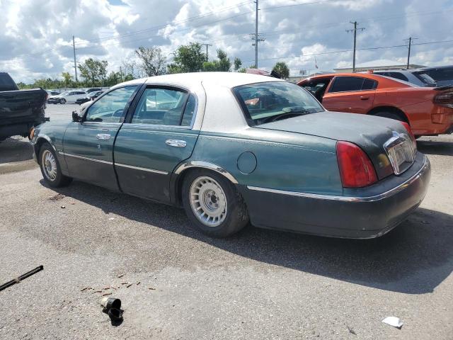 Photo 2 from auction – 2000 LINCOLN TOWN CAR E with VIN 1LNHM81W3YY778794