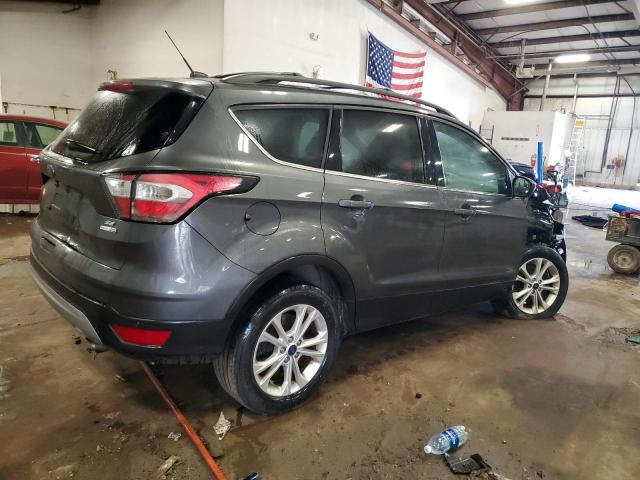 Photo 3 from auction – 2018 FORD ESCAPE SE with VIN 1FMCU9GD6JUC33580