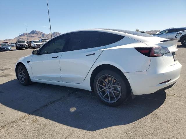 Photo 2 from auction – 2021 TESLA MODEL 3 with VIN 5YJ3E1EA0MF053102