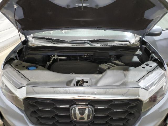 Photo 12 from auction – 2023 HONDA PASSPORT E with VIN 5FNYF8H56PB031149