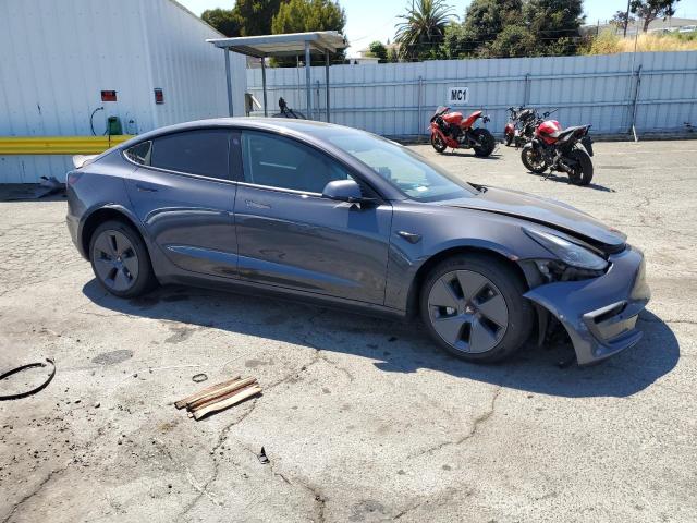 Photo 4 from auction – 2021 TESLA MODEL 3 with VIN 5YJ3E1EB9MF002318