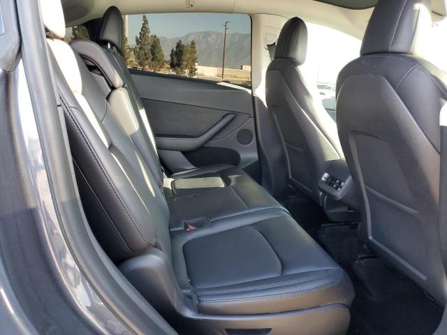 Photo 11 from auction – 2022 TESLA MODEL Y with VIN 7SAYGAEE0NF575901