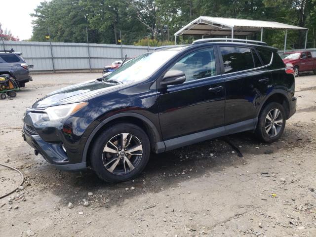 TOYOTA RAV4 XLE 2017 with VIN 2T3RFREV1HW659680 - Photo from auction
