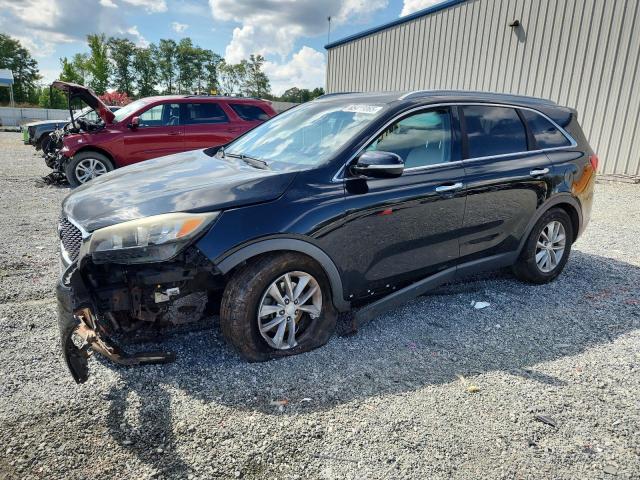 KIA SORENTO LX 2016 with VIN 5XYPG4A34GG085780 - Photo from auction